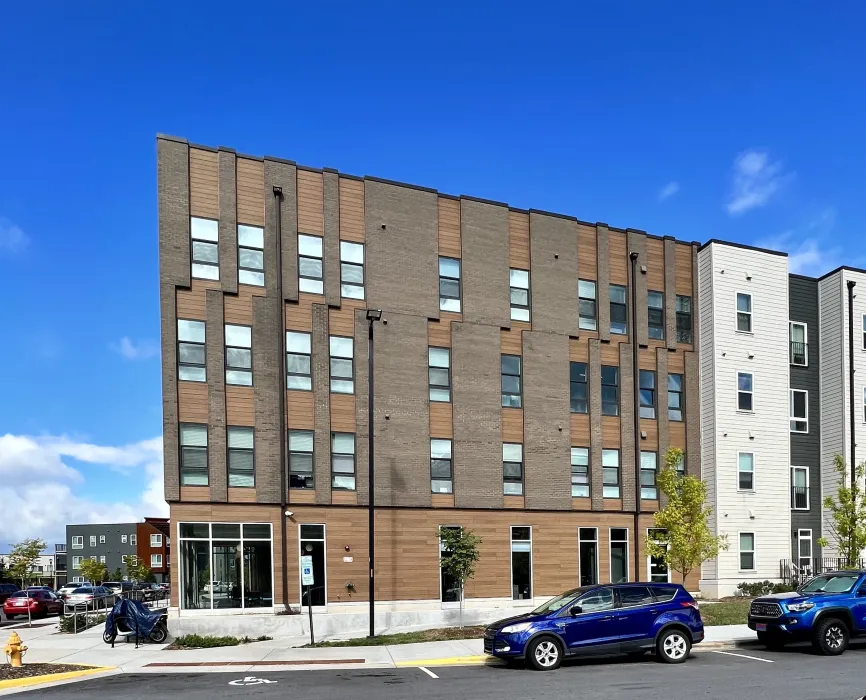 Exterior street view of Maple Crest Apartments at Lee Walker Heights in Asheville, North Carolina.