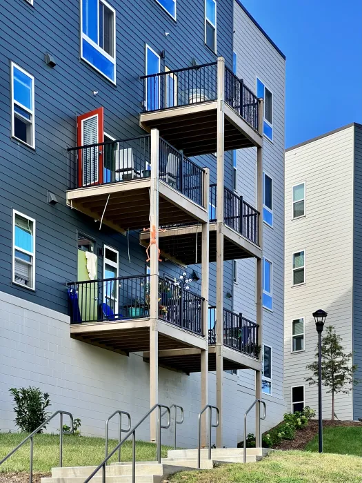 Exterior view of the balconies at Maple Crest Apartments at Lee Walker Heights in Asheville, North Carolina.