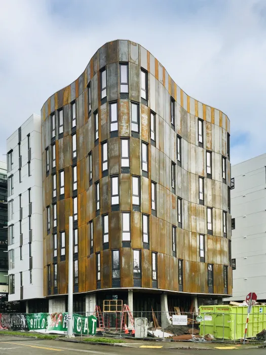 Construction of the cor-ten facade at Africatown Plaza in Seattle, Washington.