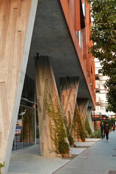 Textured concrete columns outside at Five88.