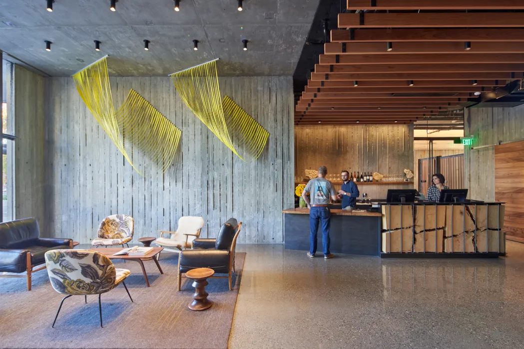 Textured concrete inside Harmon Guest House lobby.