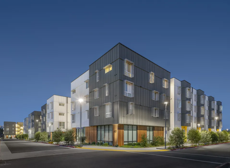 Exterior street view at dusk of 88 Park Street at Midway Village.