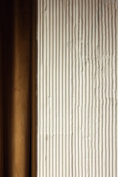 Detail of the hand-combed plaster walls.