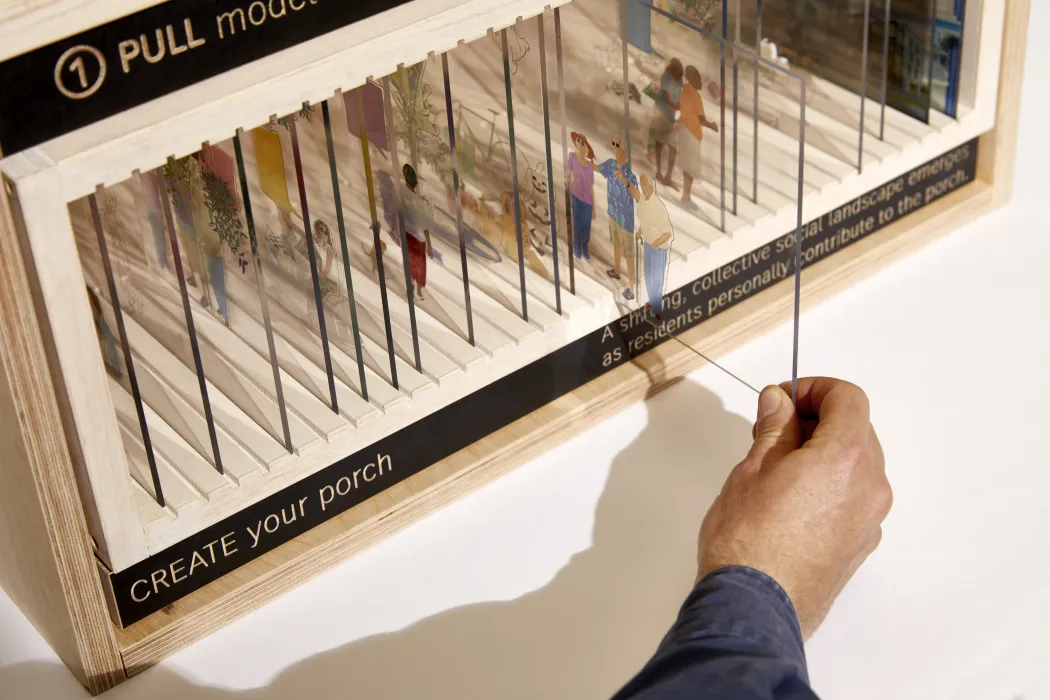 Product photography of architectural model, detail showing interaction