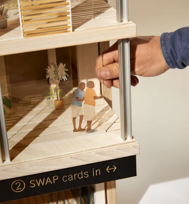 Product photography of architectural model, detail showing interaction