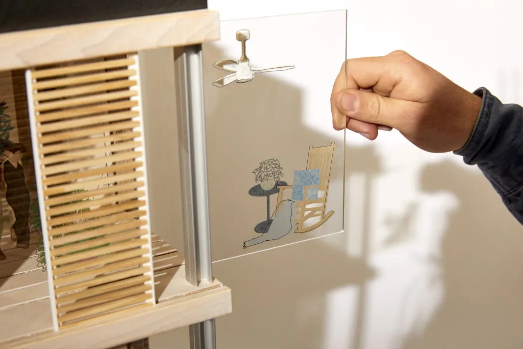 Product photography of architectural model, detail showing interaction
