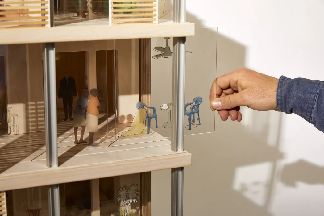 Product photography of architectural model, detail showing interaction