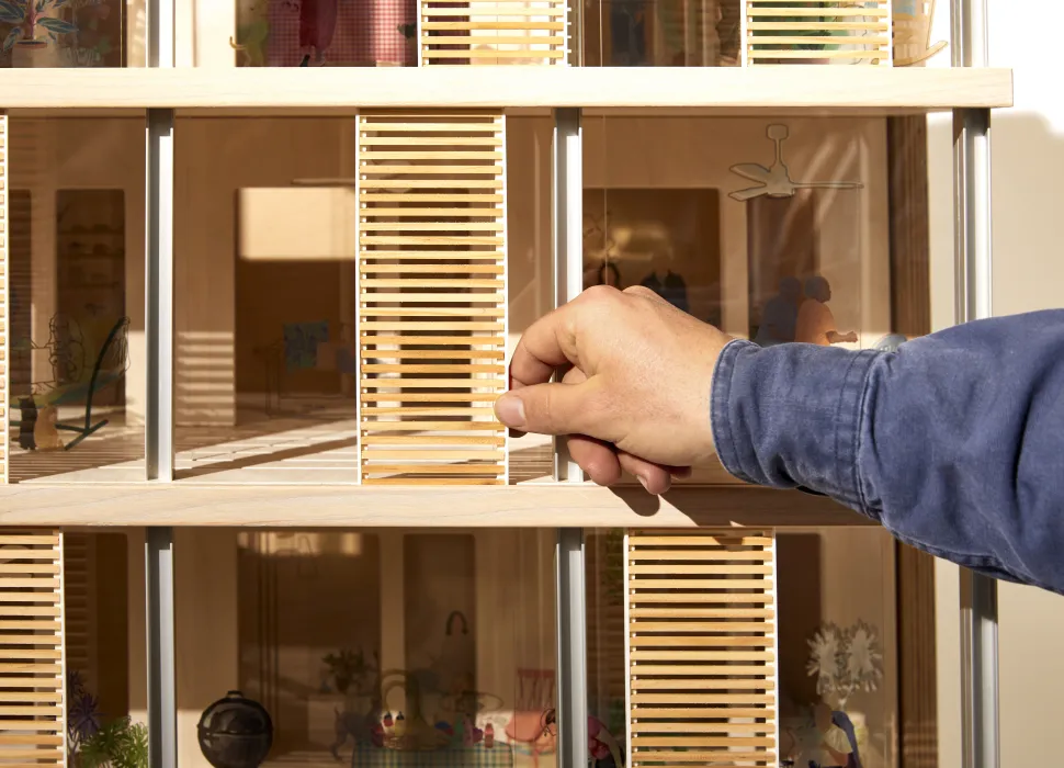 Product photography of architectural model, detail showing interaction