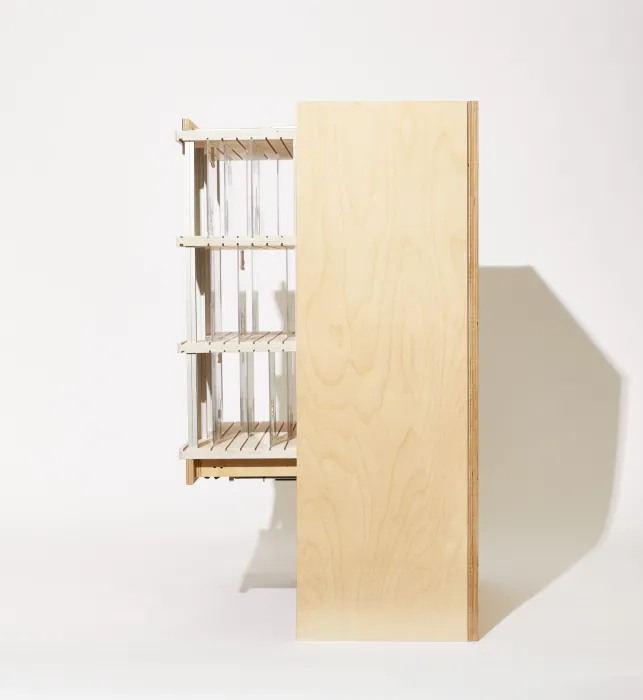 Product photography of architectural model, side view with mechanism extended