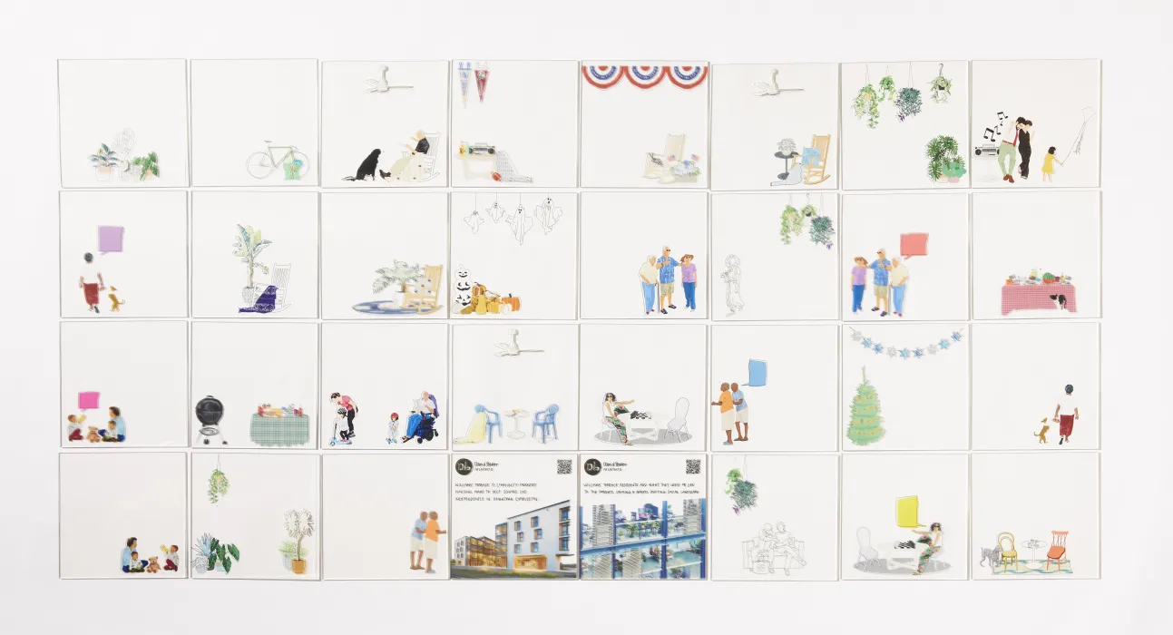 Flay lay of acrylic cards showing figures and accessories