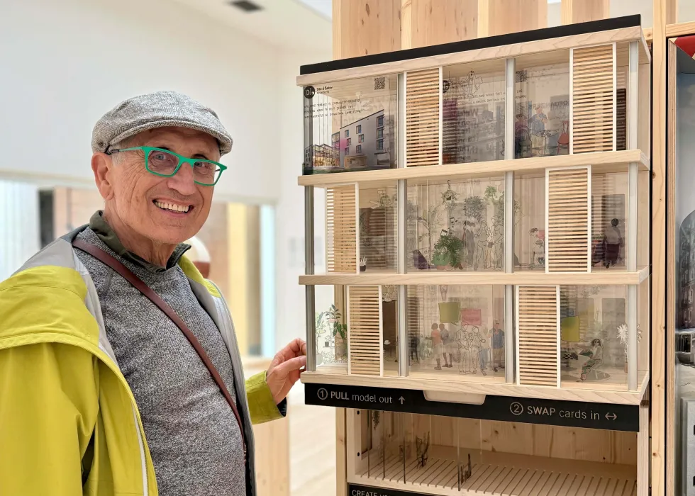 David Baker posing next to the installation.