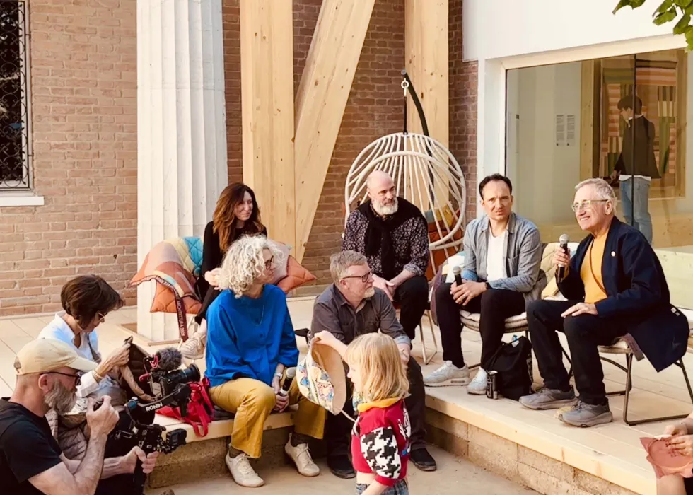 Group of people listening at the Venice Biennale