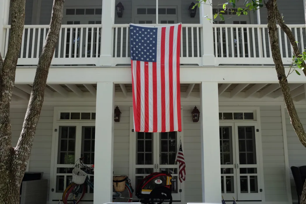 house with american flag.