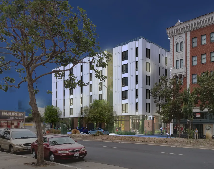 Rendering view of building elevation from across street at night