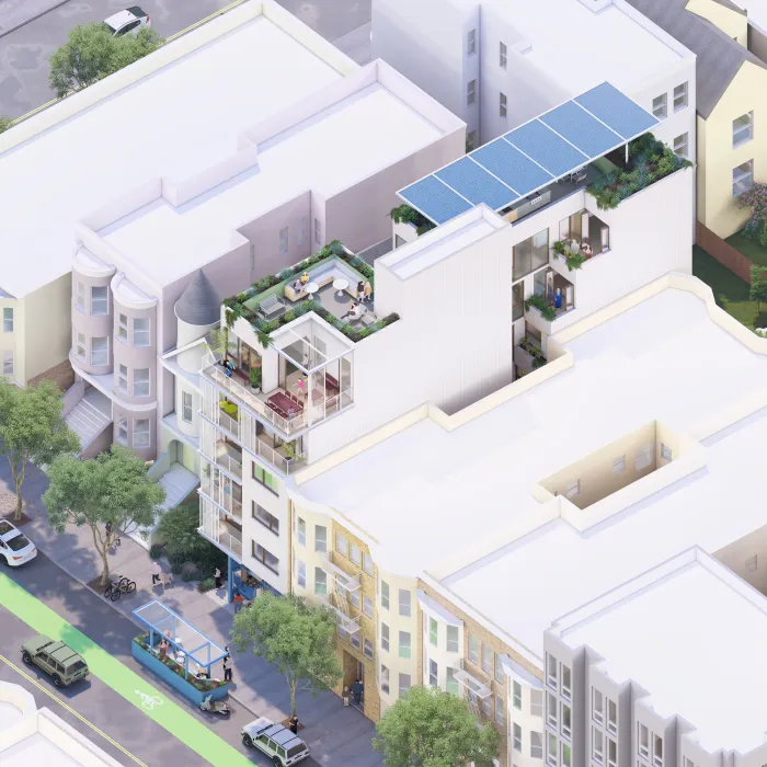 Aerial view showing the mid-rise apartment building with roof garden and solar 