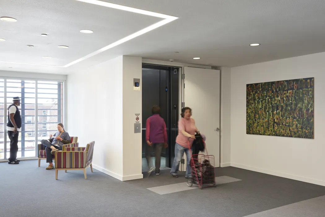 Elevator lobby with broad seating area