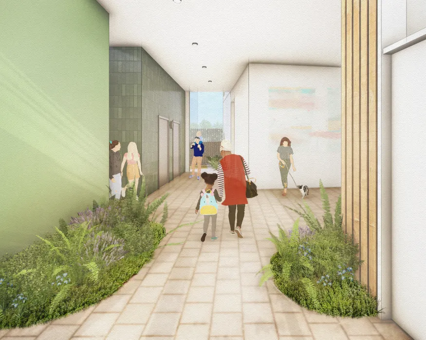 Green and white interior walls with elevator doors and woman and child walking  