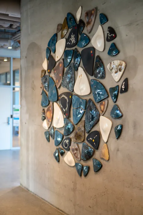 Custom tile installation in blues, browns, and white