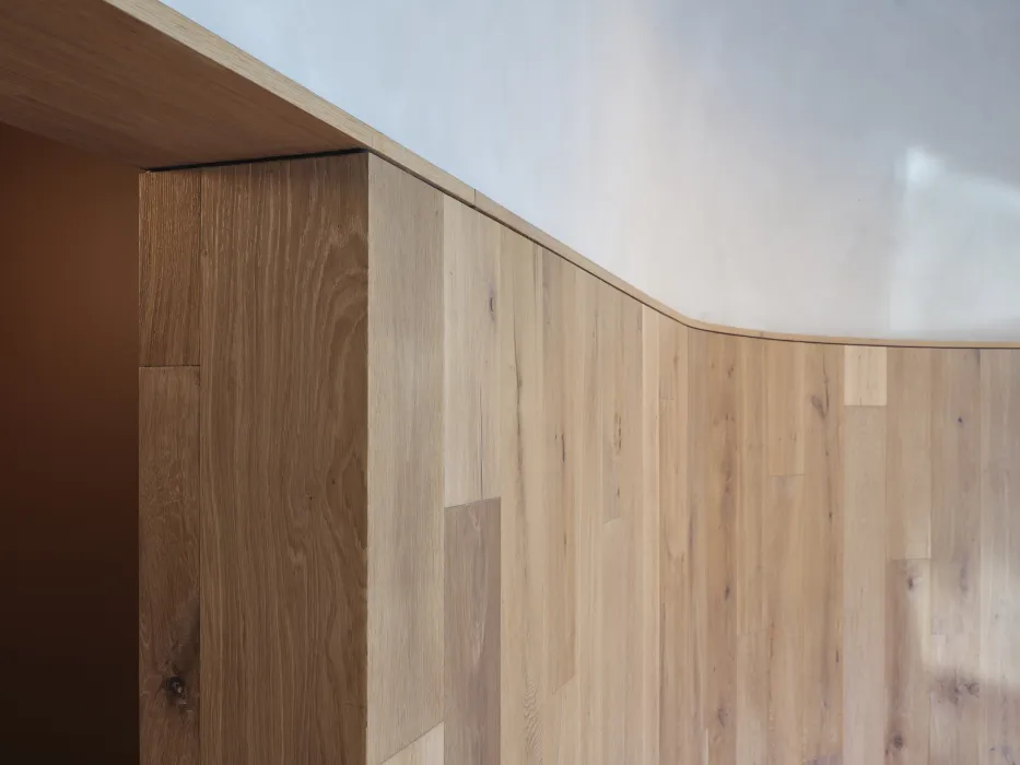 Detail photo shows the wood walls