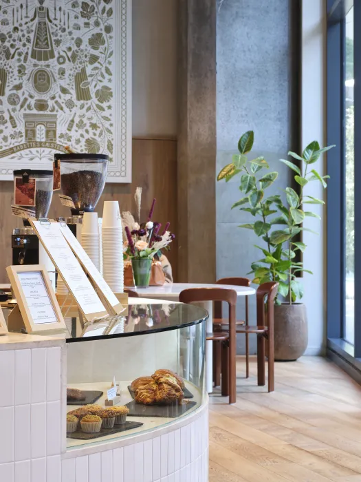 The compact, elegant ordering counter features pastry display