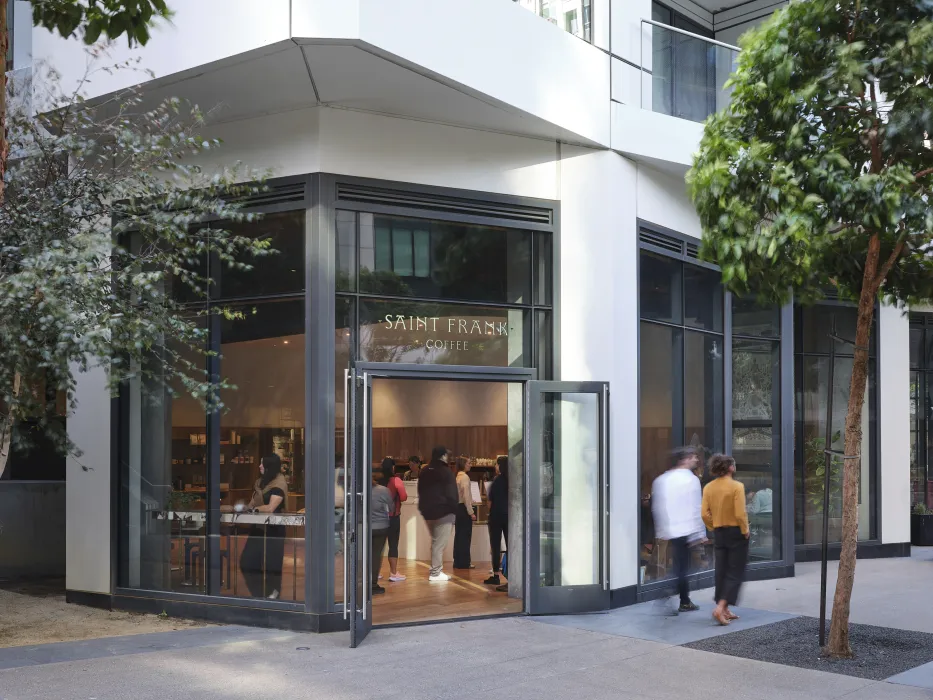 Exterior view of the coffee shop at the base of the Mira tower