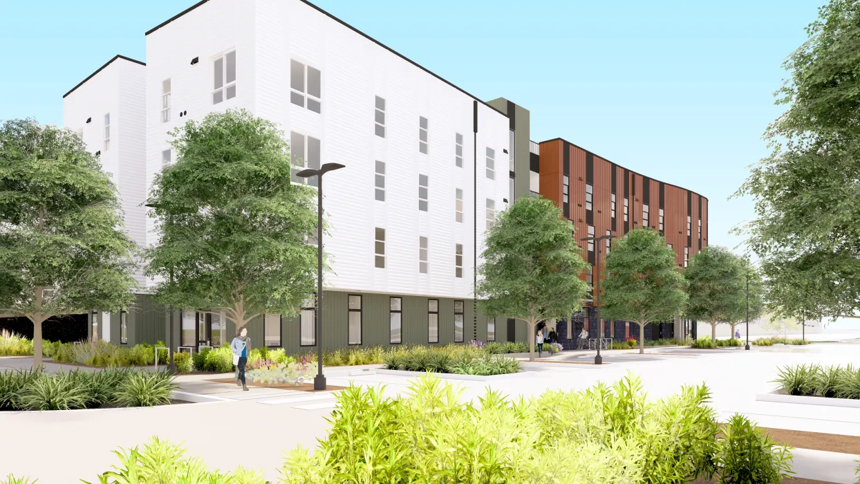 Rendering view of a four-story building with articulated massing and varied cladding.