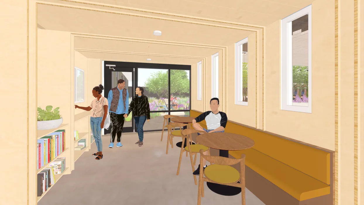 Rendering view of small library space with low bookshelves and small tables.